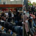 Para pengunjuk rasa non Muslim membentuk lingkaran di sekitar Muslim sehingga mereka bisa salat dengan aman selama demonstrasi Black Lives Matter menuntut keadilan bagi George Floyd.[Twitter StanceGrounded/Metro.co.uk]